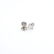 A pair of elegant 10k gold stud earrings, featuring a classic design. The earrings are crafted with precision, showcasing the rich tone and luster of 10k gold. Perfect for adding a touch of sophistication to any outfit, these timeless studs are versatile and stylish, suitable for any occasion