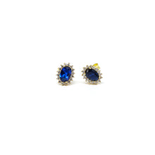A pair of elegant 10k gold stud earrings, featuring a classic design. The earrings are crafted with precision, showcasing the rich tone and luster of 10k gold. Perfect for adding a touch of sophistication to any outfit, these timeless studs are versatile and stylish, suitable for any occasion
