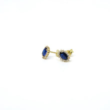 A pair of elegant 10k gold stud earrings, featuring a classic design. The earrings are crafted with precision, showcasing the rich tone and luster of 10k gold. Perfect for adding a touch of sophistication to any outfit, these timeless studs are versatile and stylish, suitable for any occasion