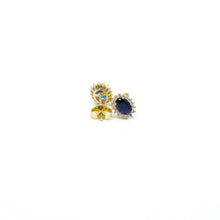 A pair of elegant 10k gold stud earrings, featuring a classic design. The earrings are crafted with precision, showcasing the rich tone and luster of 10k gold. Perfect for adding a touch of sophistication to any outfit, these timeless studs are versatile and stylish, suitable for any occasion